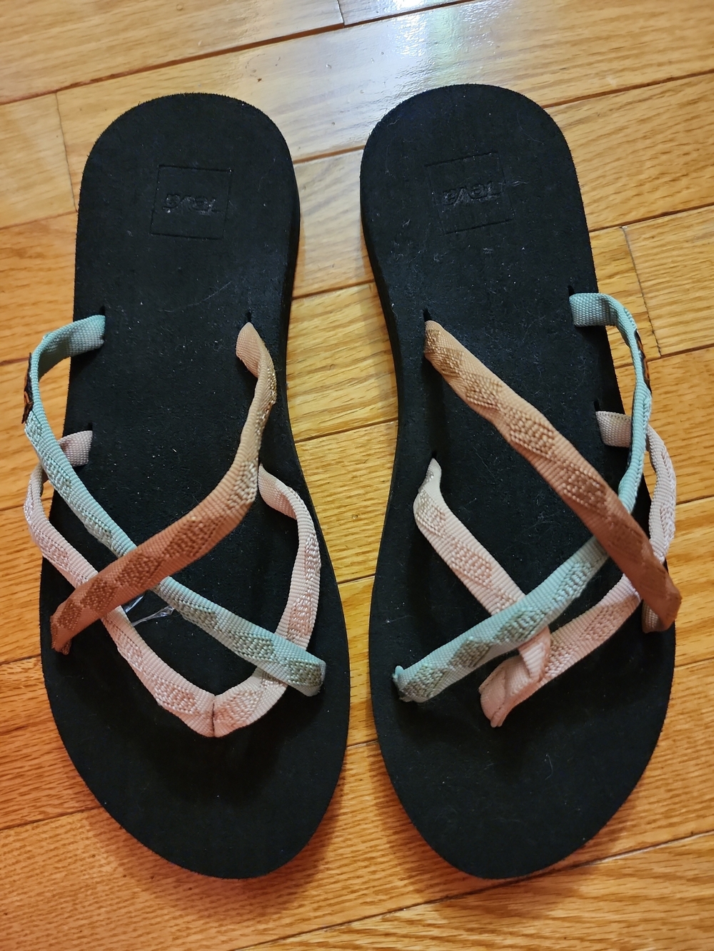 Teva Olowahu Women's Strappy Flat Sandals in Black with Peach & Green Straps